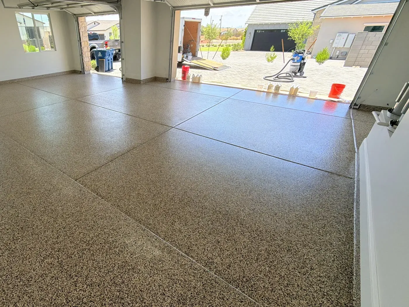 Chestnut flake blend garage floor, looking out through the open doors